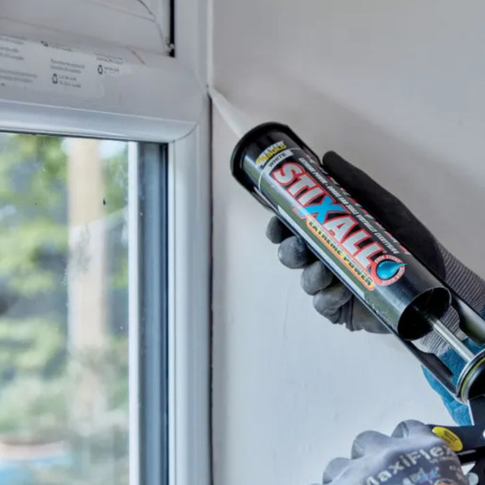 An Image of Everbuild Stixall Extreme Power being used to seal a window.