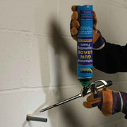 An image of Everbuild Professional Gun Grade Expanding Foam being sprayed around an outlet pipe.