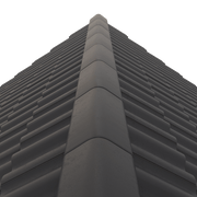 An image of a FPMcCann Concrete Multi Ridge Tile on a roof to show what it would look like.