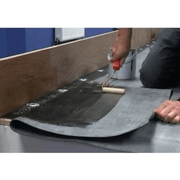 An image of FlexiProof Contact Bonding Adhesive being applied to EPDM rubber roofing.