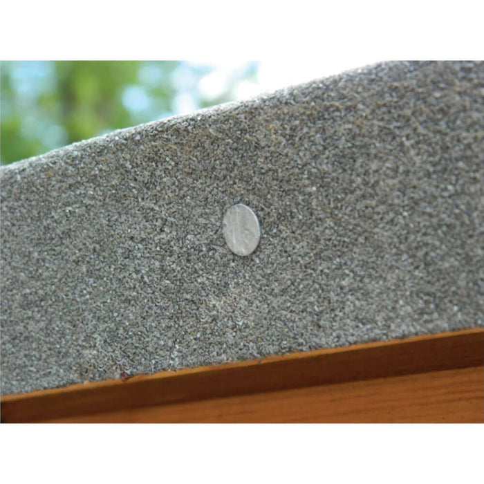 An image of a Galvanised Felt Clout Nail in 13mm being used to tac down shed felt to a timber roof.