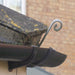 An image of a Galvanised Roof Hip Iron installed on the edge of the roof