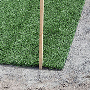 An image of Grano Dust 0-4mm being used as a base to lay artificial grass.