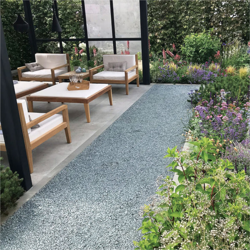 An image of Green Granite stones laid as a garden path in dry conditions.