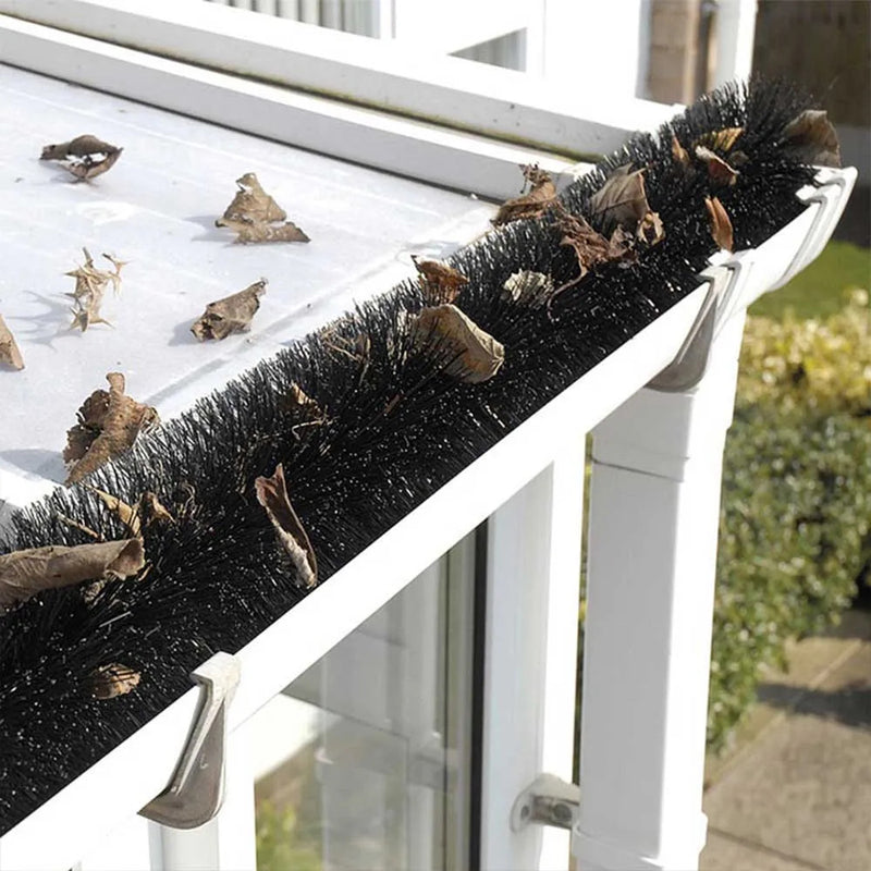 An image of a fully installed Gutter Brush Guard System and how it keeps leaves out of a gutter