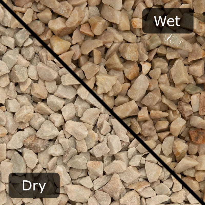 An image of Heritage Quartz gravel stones with a diagonal split down showing them wet and dry