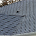 An image of a roof with IKO 3 Tab Armourshield Hexagonal  Roofing Shingles in grey