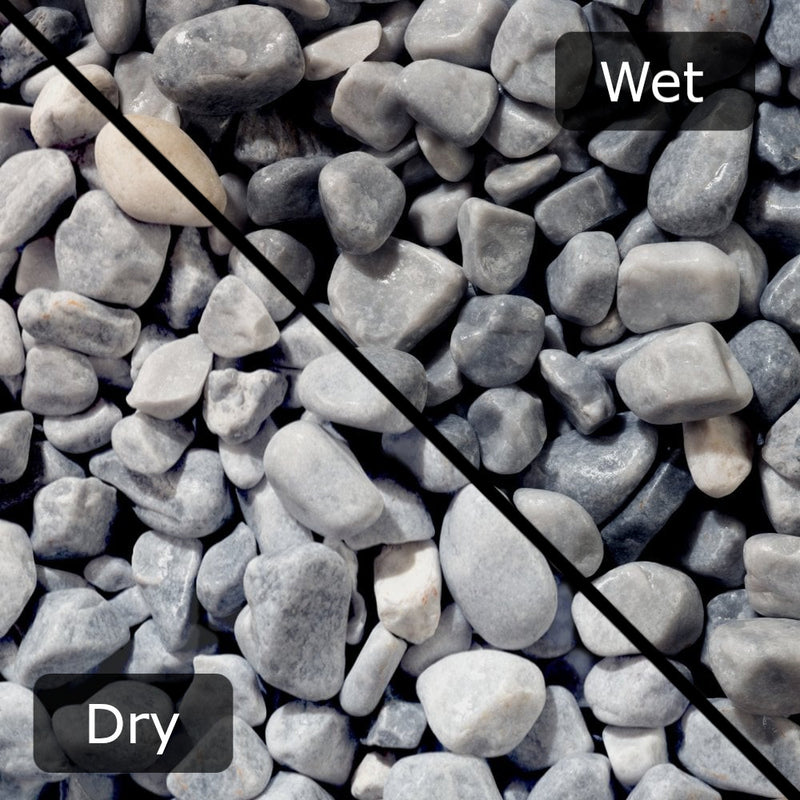 An image showing Ice Blue Pebble Stone Aggregate Gravel. The image is split horizontally to sow the difference between wet and dry.