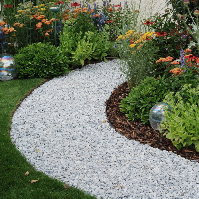 An image of Ice Blue Garden Stones and what they look like when used as a garden path.