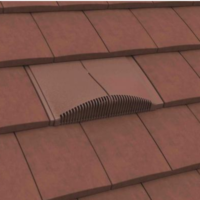 Image of a Manthorpe Interlocking Plain Tile Vent in the colour Antique Red on a roof to show the profile in line with tiles.