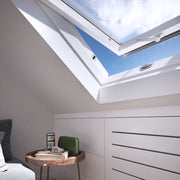An image showing a close up of a Dakea Secure White Centre Pivot Roof Window in white KAQ B1010Q and the locking mechanism