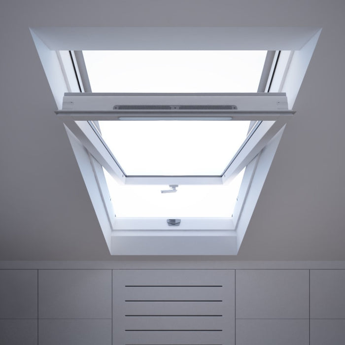An image showing a close up of a Dakea Secure White Centre Pivot Roof Window in white KAQ B1010Q and the locking mechanism 