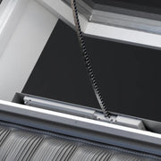 An image showing a Dakea Smoke Vent Energy Window for Sloped Roofs in White - KAS B1010 and what it looks like from the outside.
