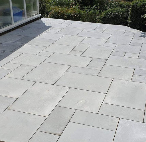 An image of Kandla Grey Indian Sandstone Paving laid out to show what it looks like.