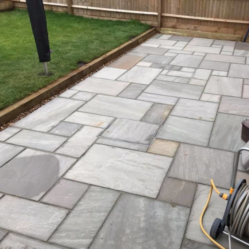 An image of Kandla Grey Indian Sandstone Paving laid out to show what it looks like.