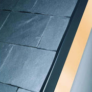 An image of Klober Uni Line Continuous Dry Verge T Strip fitted to a roof.
