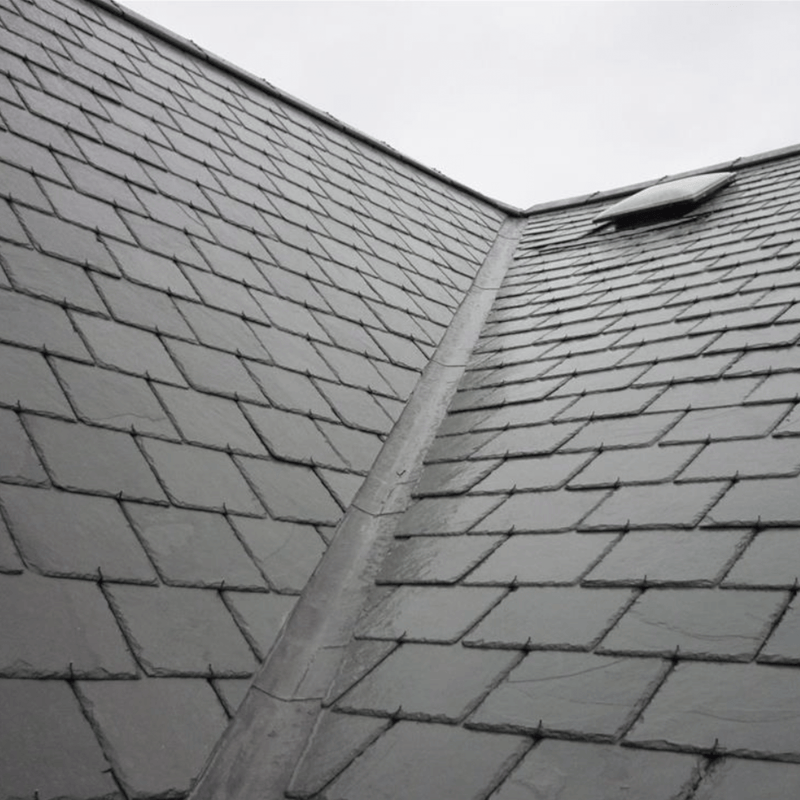An image of Code 4 Lead being used as a Valley down the middle on a pitched roof.