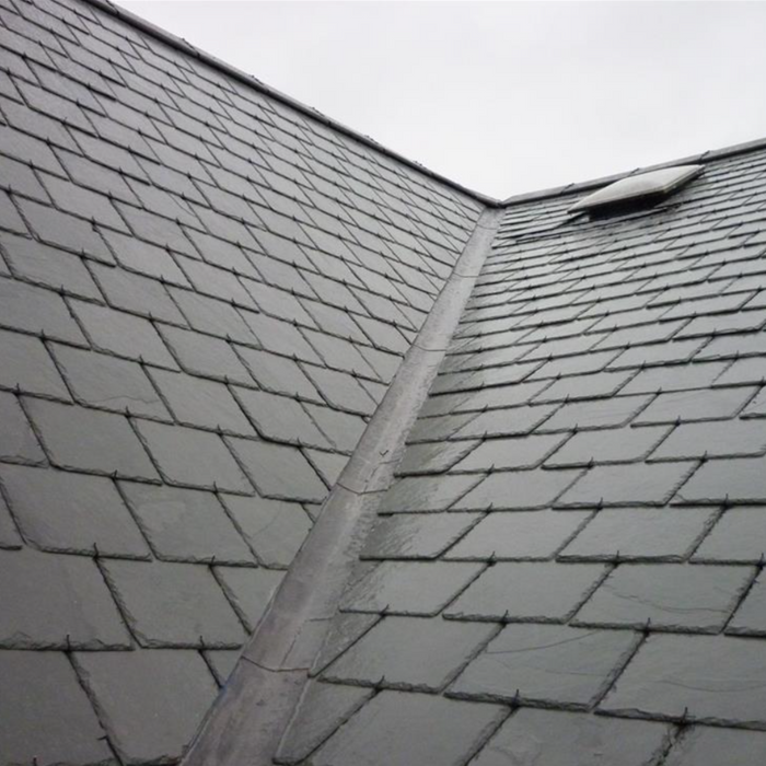 An image of Code 4 Lead being used as a Valley down the middle on a pitched roof.