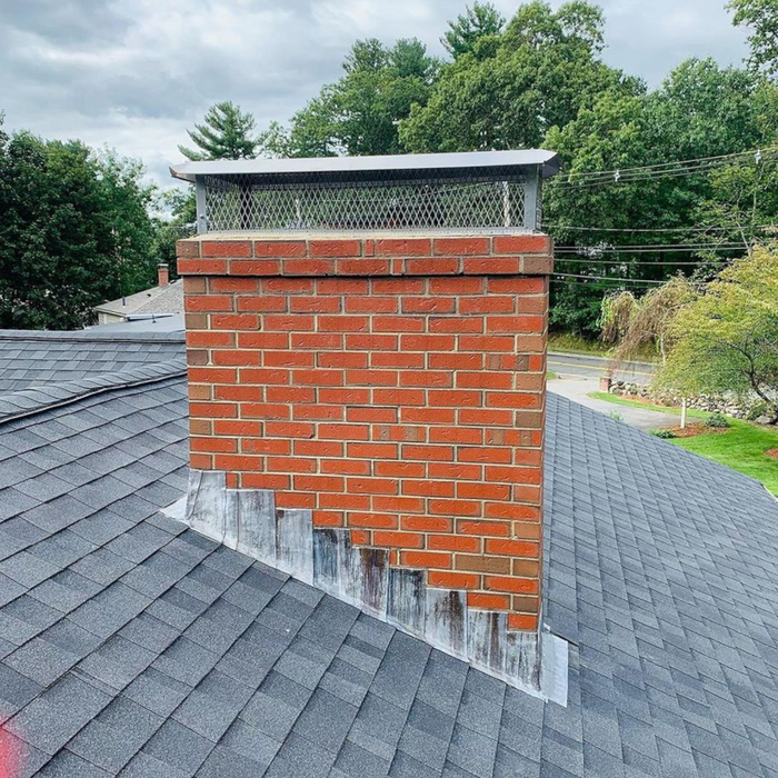 An image of Code 4 Lead being used as Chimney Flashing on a pitched roof.