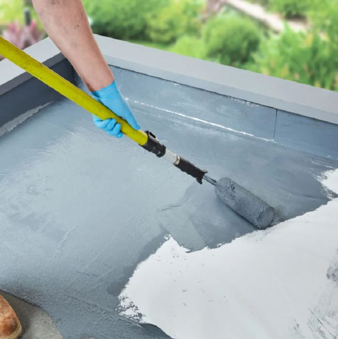 An image of a tin of Everbuild Aquaseal Liquid Roof being applied to a roof with a roller