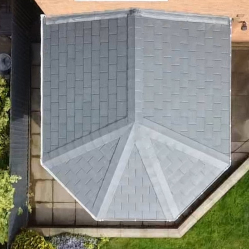 A conservatory roof in Lightweight Metal Roof Shingles with a 5 way ridge top cap.
