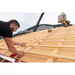 An image of people on a roof using the Longo Chalk Line Reel to make a chalk line on a roof.