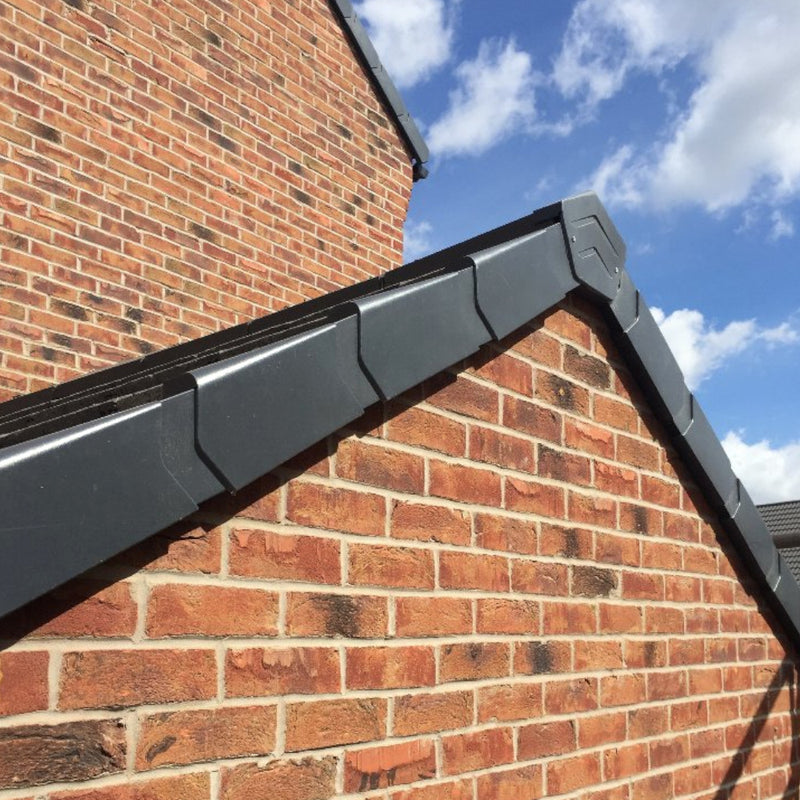 An image of Manthorpe GDV Angles End Cap Grey on the side of a roof to show what it looks like.