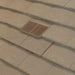 An image of Manthorpe Granulated Plain Tile Vent in Antique Brown on a roof to show the finish.