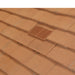 An image of Manthorpe Granulated Plain Tile Vent in Sand Red on a roof to show the finish.