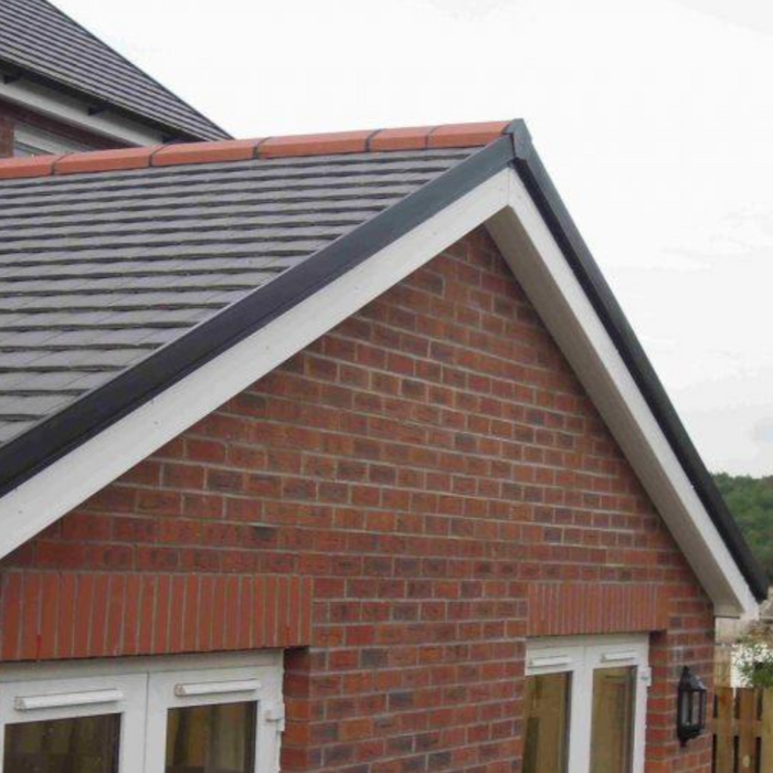 An image of Manthorpe Smartverge Linear Dry verge in Grey on the edge of a roof to show what it looks like.