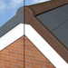 An image of Manthorpe Smartverge Linear Dry verge in both Brown and Grey on the edge of a roof to show what it looks like.