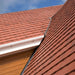 An image of Marley Ashmore Interlocking Tiles laid and installed onto a pitched roof to show how they look.