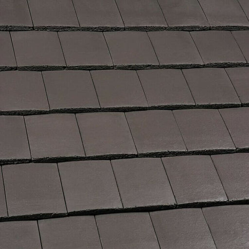 An image of Marley Ashmore Interlocking Tiles in Smooth Brown.