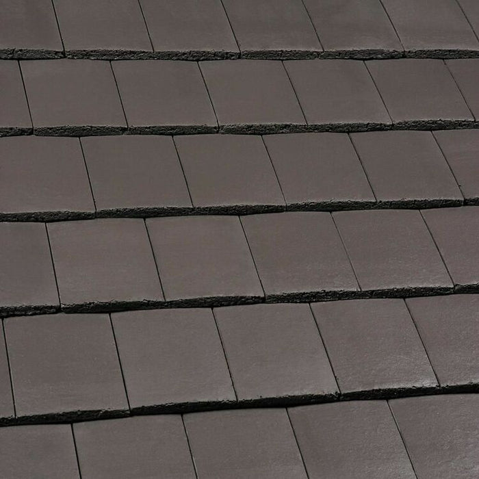 An image of Marley Ashmore Interlocking Tiles in Smooth Brown.