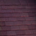 An image of Marley Concrete Plain Tiles in Dark Red