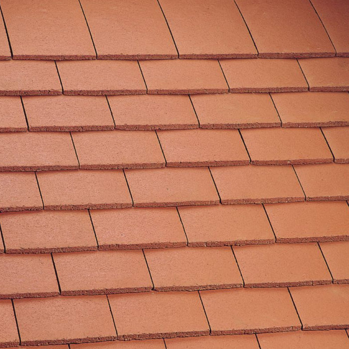 An image of Marley Concrete Plain Tiles in Mosborough Red.