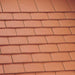 An image of Marley Concrete Plain Tiles in Mosborough Red.