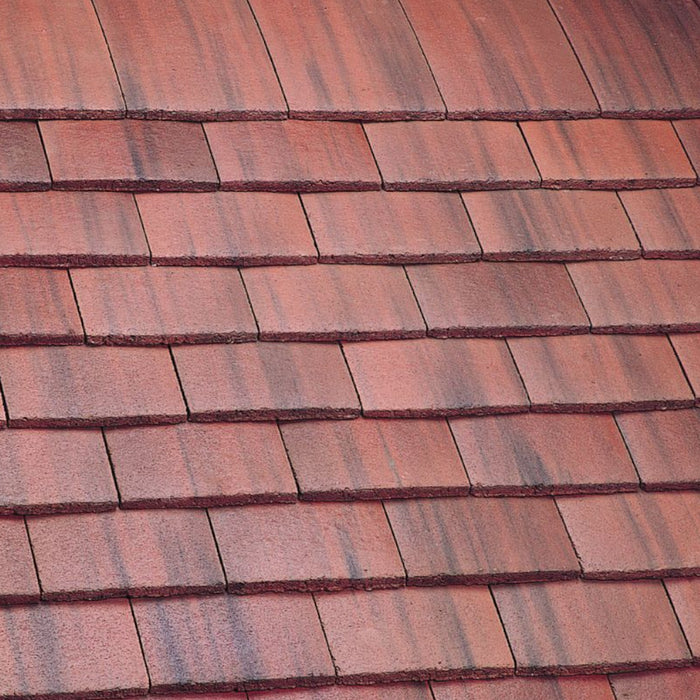 An image of Marley Concrete Plain Tiles in Old English Dark Red.