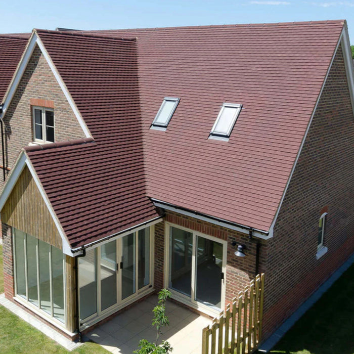 An image of a roof fitted with Marley Concrete Plain Tiles to show what they look like.