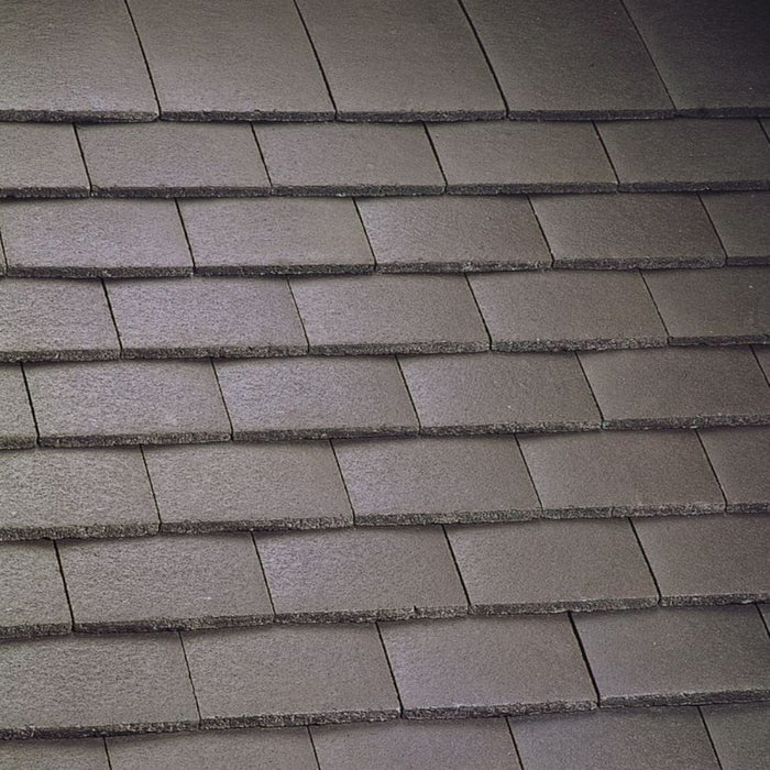 An image of Marley Concrete Plain Tiles in Smooth Brown.