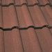 An image of Marley Double Roman Interlocking Tiles in Antique Brown.