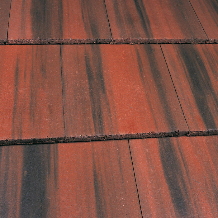 An image of Marley Edgemere Interlocking Slates in Old English Dark Red.