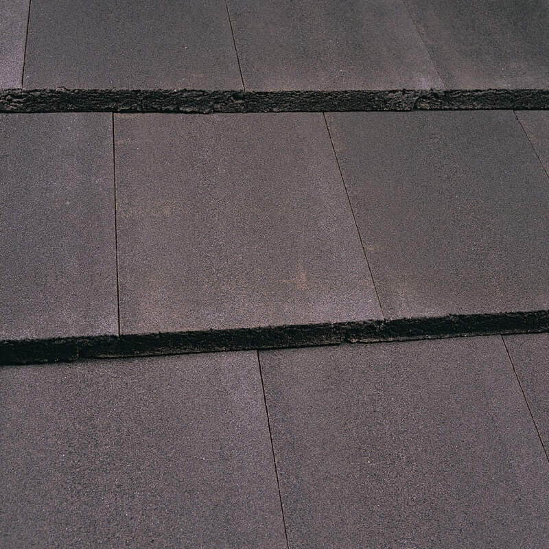 An image of a Marley Modern Interlocking Roof Tile Antique Brown.