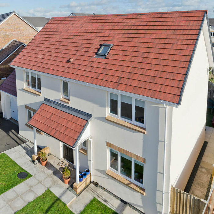 An image of a roof fitted with Mosborough Red Marley Modern Interlocking Tiles to show what they look like.