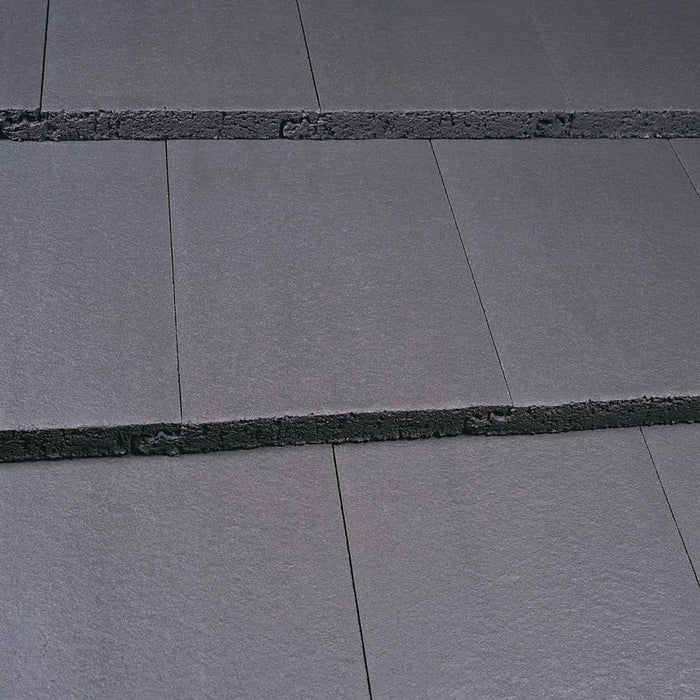 An image of a Marley Modern Interlocking Roof Tile Smooth Grey.