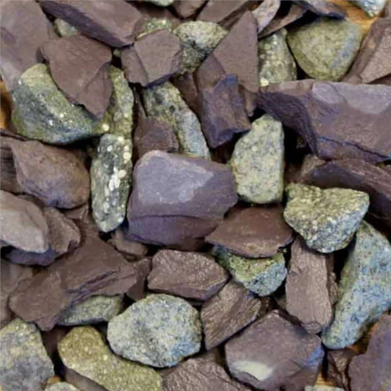 An image of the aggregate in the colour of Mermaid Mix which are 20mm in size. They are in greens and plum Purple shades.
