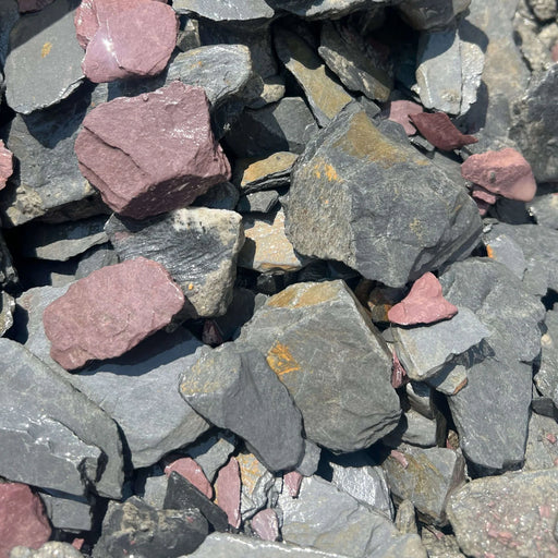 An image of Mixed Slate Chippings 40mm in size. Including Blue Slate, Purple Slate, Charcoal Slate and Green Slate Chippings.