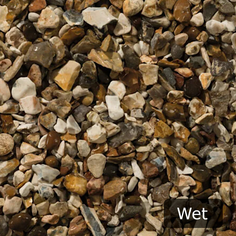 An image of Moonstone aggregates by Long Rake Spar, the image shows what the stone looks like when wet.