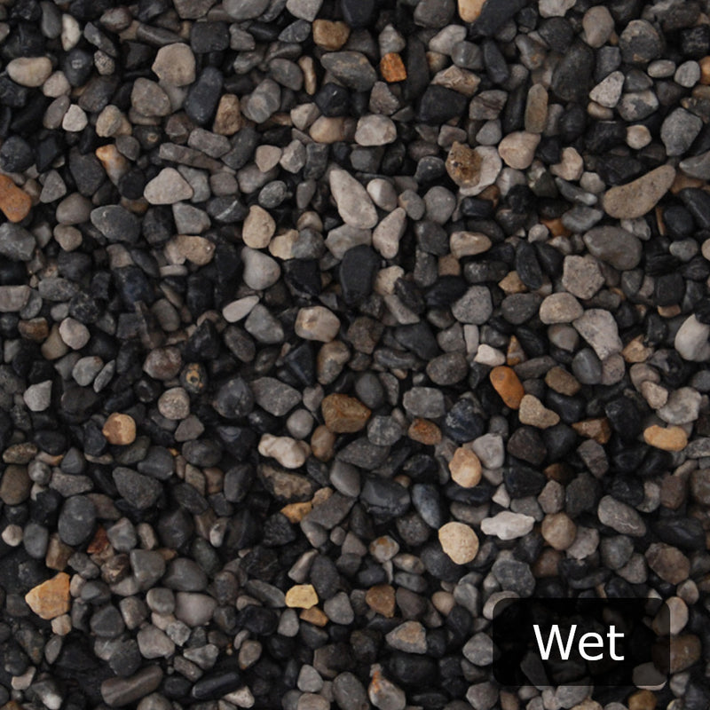 An image showing Ocean Blue Pebble Stone Aggregate Gravel when they are wet.