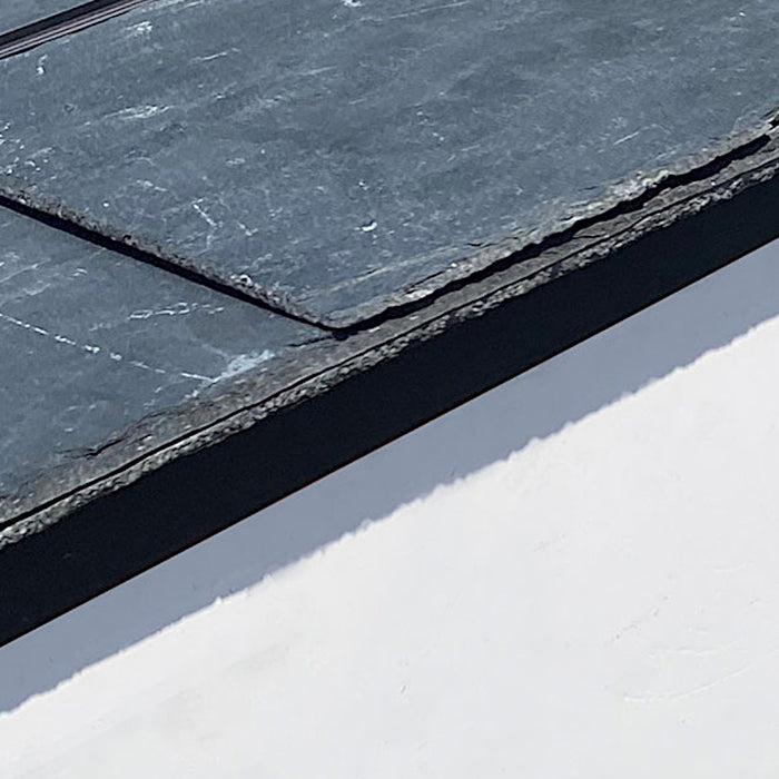 An image showing a Permavent Easy Trim and how it looks when fitted with slates